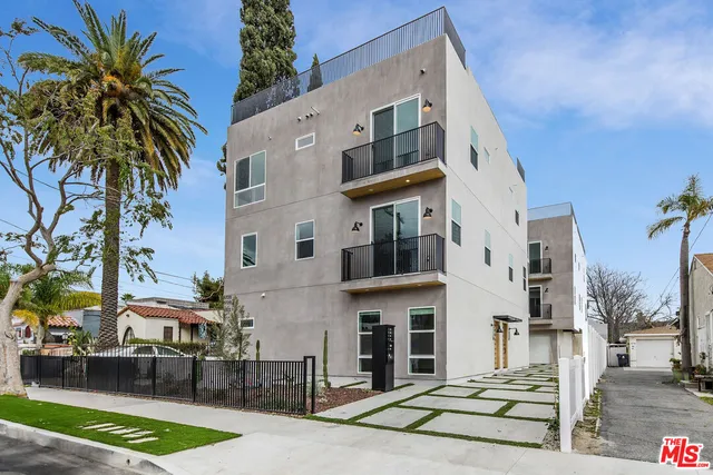 a front view of a building with street