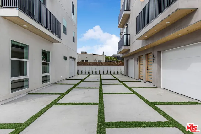 a view of a street with houses