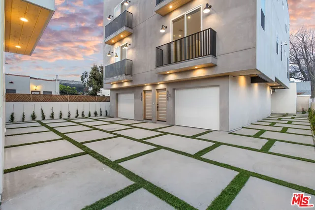 a view of a house with a street