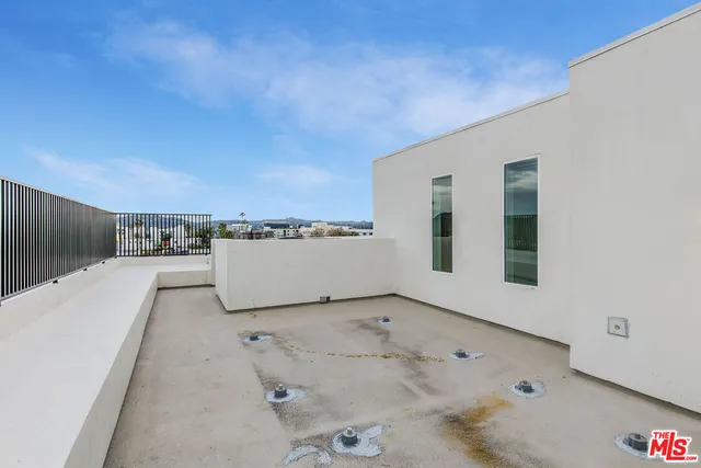 a view of city with tall buildings