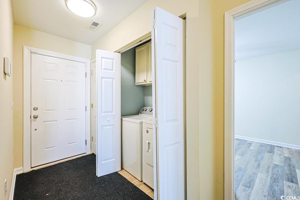 833 Silvercrest Drive Myrtle Beach, SC 29579 - Photo 21 of 30 Washroom featuring light wood-type flooring and cabinet space