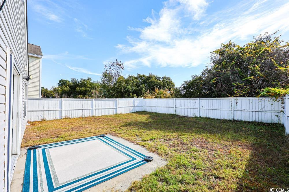 833 Silvercrest Drive Myrtle Beach, SC 29579 - Photo 22 of 30 Fenced backyard featuring a patio area