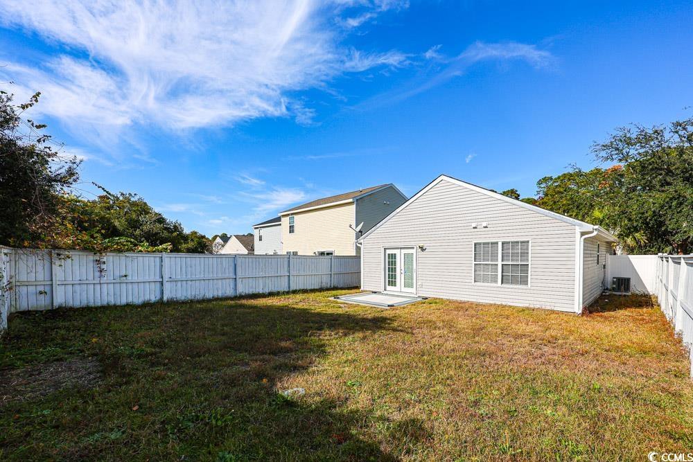 833 Silvercrest Drive Myrtle Beach, SC 29579 - Photo 23 of 30 Back of property with a fenced backyard