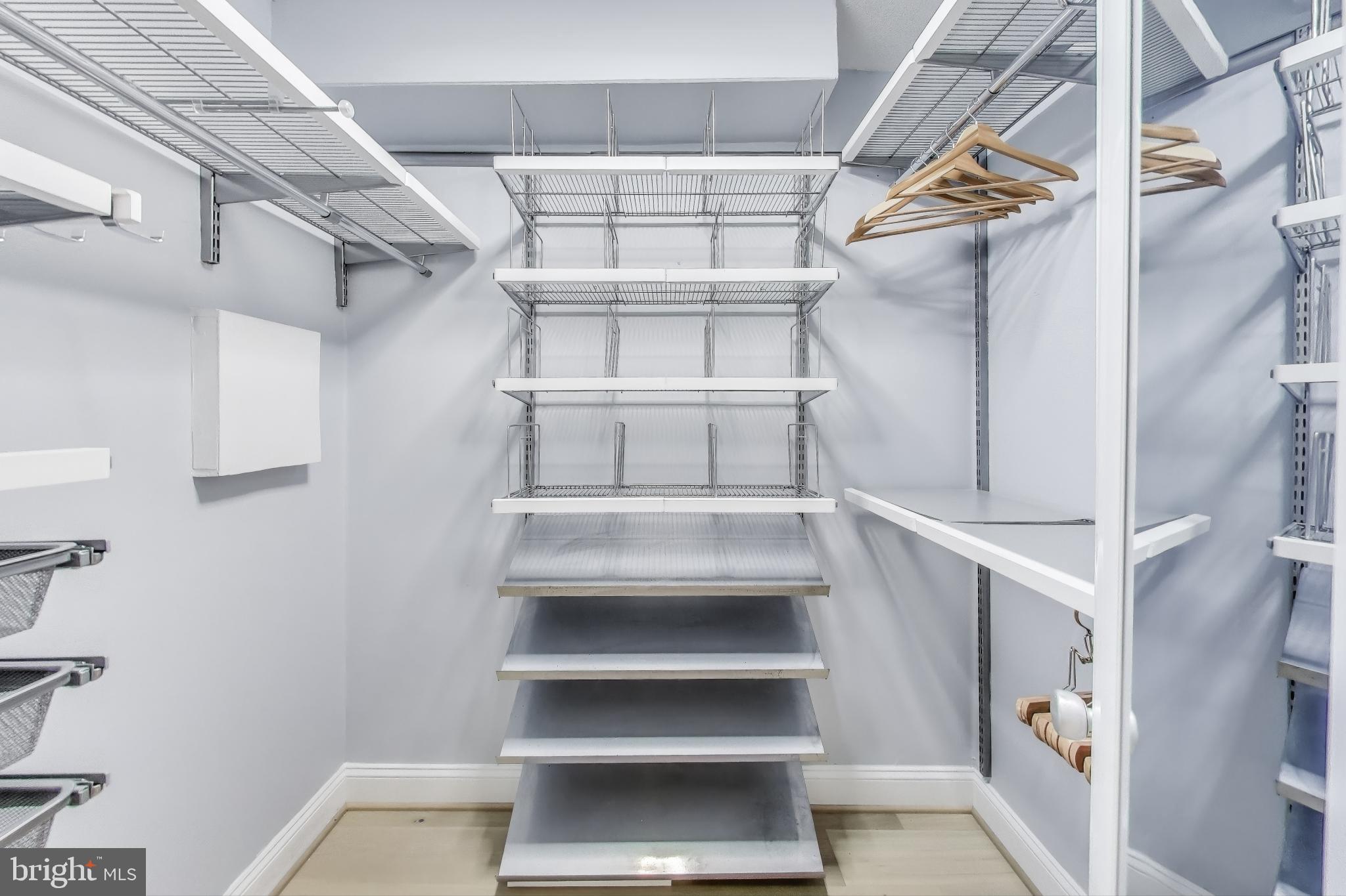 490 M Street Southwest, Unit W802 Washington, DC 20024 - Photo 15 of 23 a view of walk in closet with empty racks