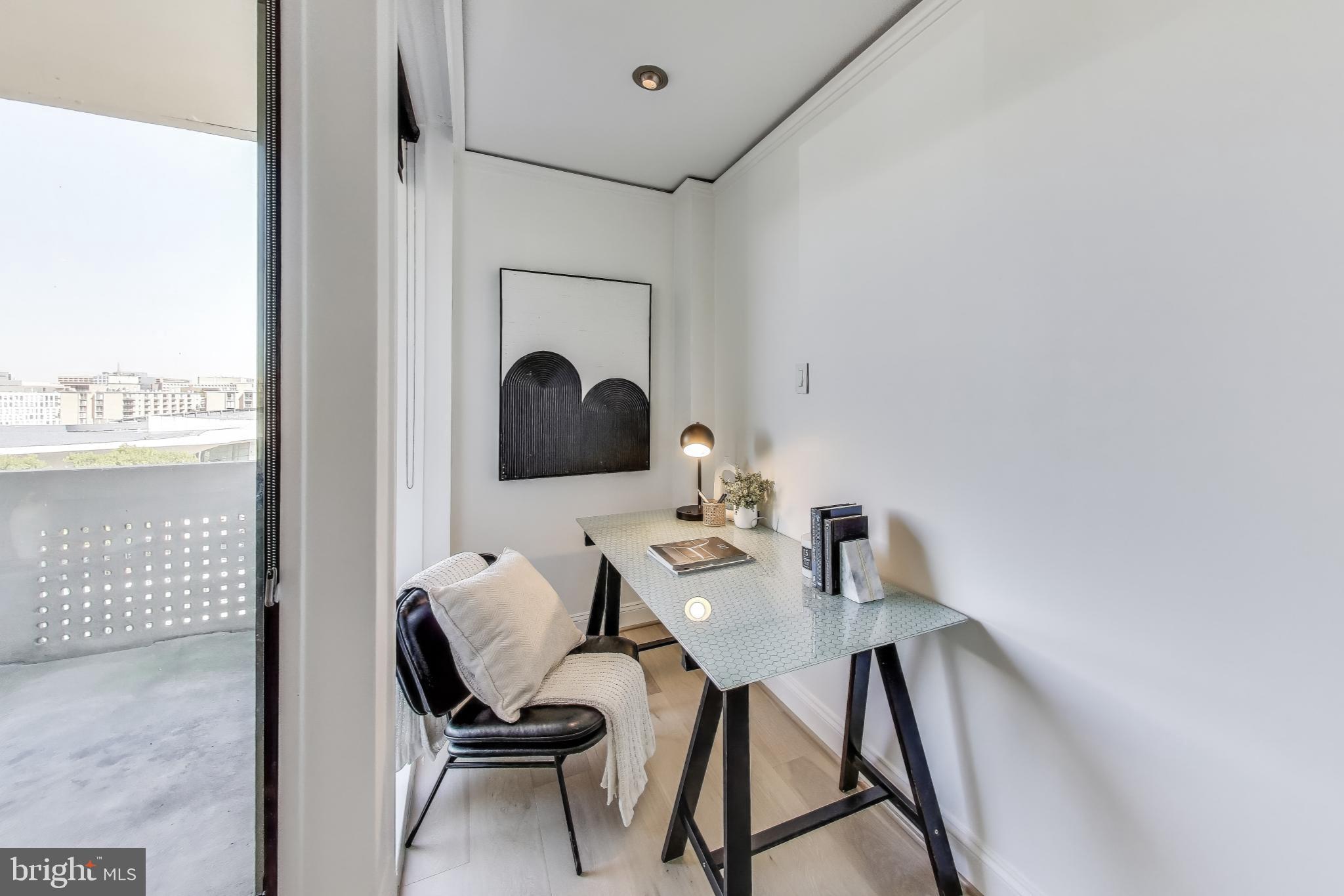 490 M Street Southwest, Unit W802 Washington, DC 20024 - Photo 6 of 23 a view of a workspace with furniture