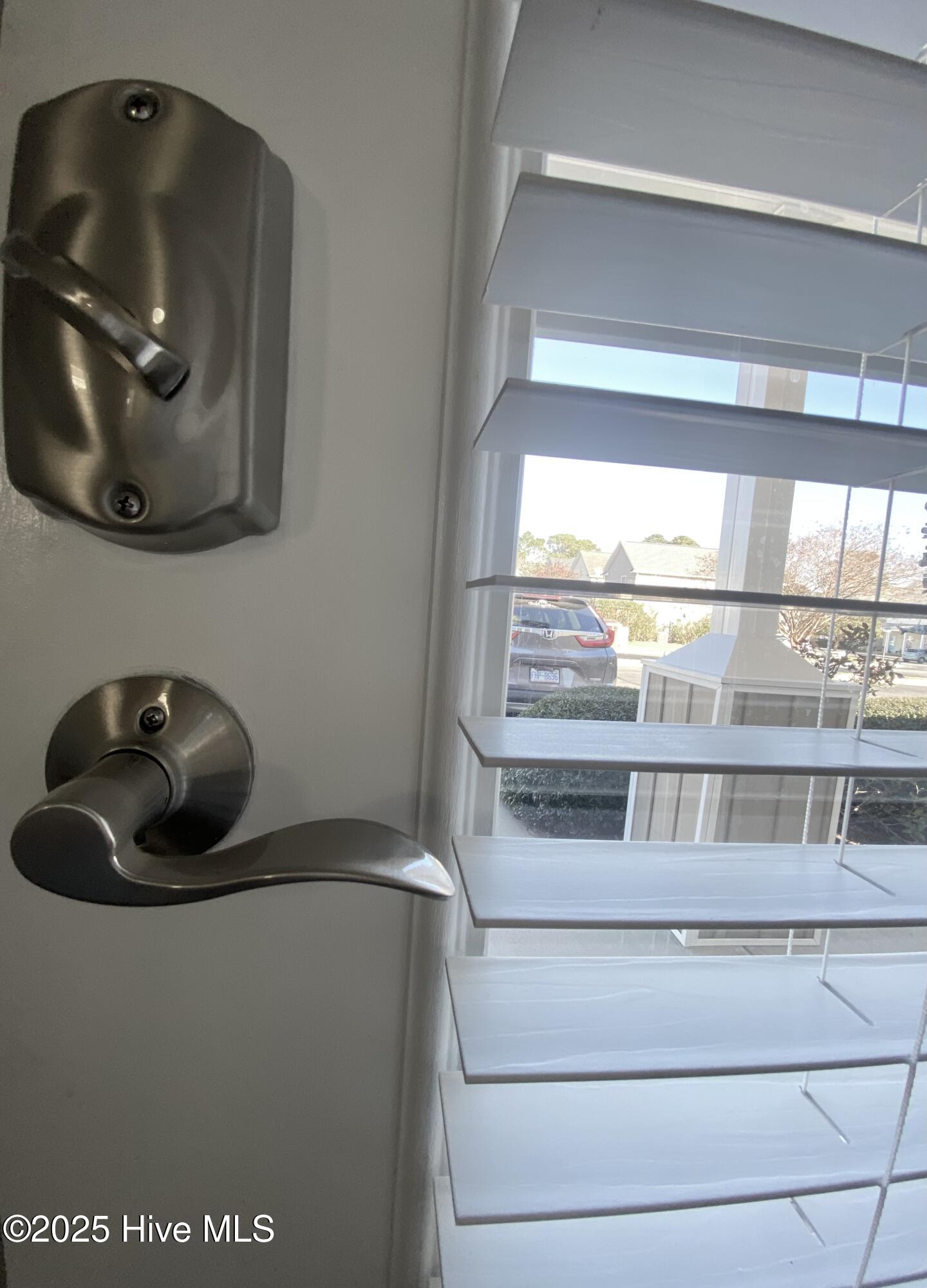 842 Kiawah Lane Wilmington, NC 28412 - Photo 20 of 51 Front door hardware/combo lock