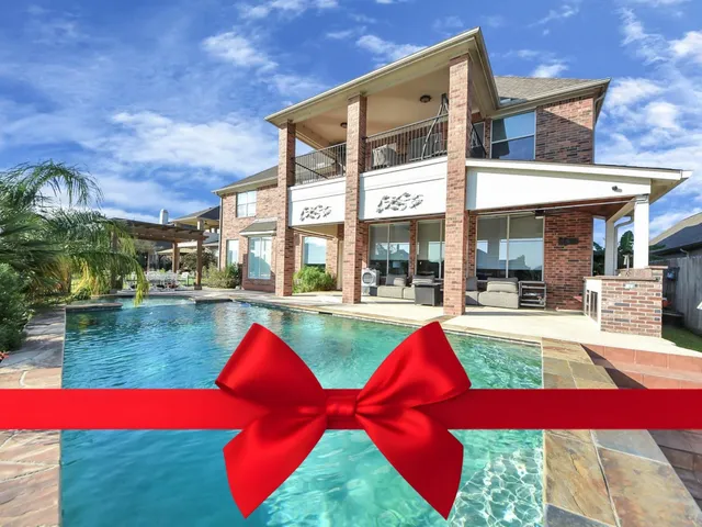 a view of swimming pool with outdoor seating