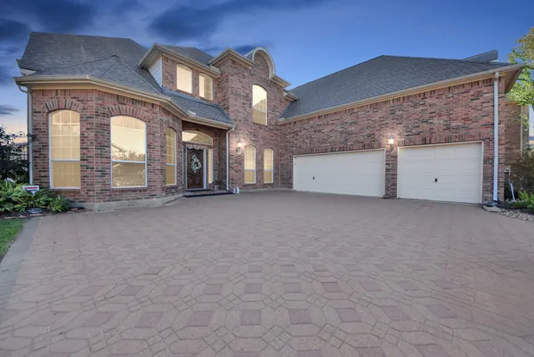 a view of a building with a garage