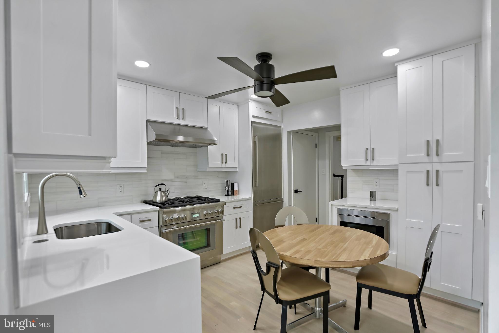 3906 Ridge Road Annandale, VA 22003 - Photo 8 of 34 Modern kitchen with sleek design elements.