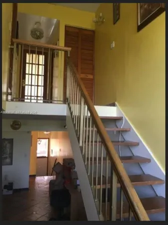 a spacious bathroom with a double vanity sink and a mirror