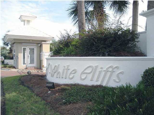 Lot 1 White Cliffs Boulevard Santa Rosa Beach, FL 32459 - Photo 11 of 11 a view of a white house with a sign broad