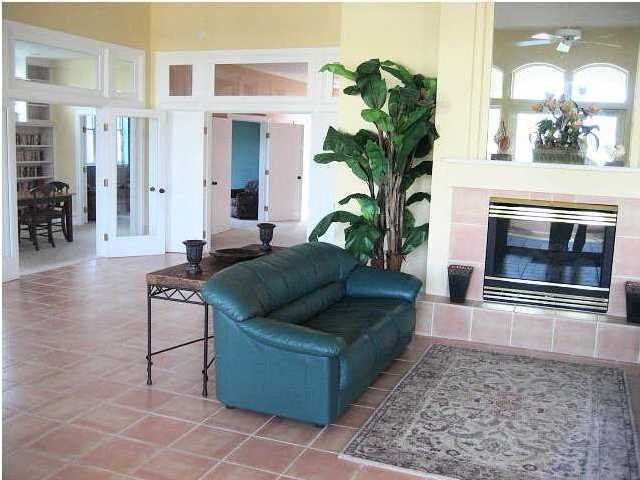 Lot 1 White Cliffs Boulevard Santa Rosa Beach, FL 32459 - Photo 8 of 11 a living room with furniture and a fireplace