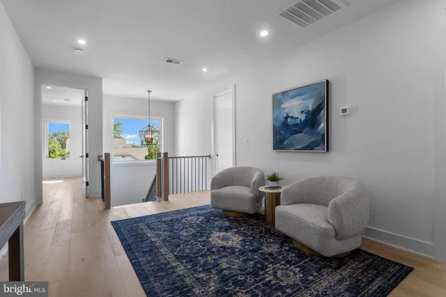 a view of room with wooden floor