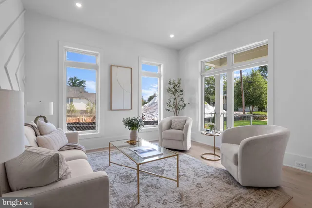 a kitchen with a dining table chairs counter space and appliances
