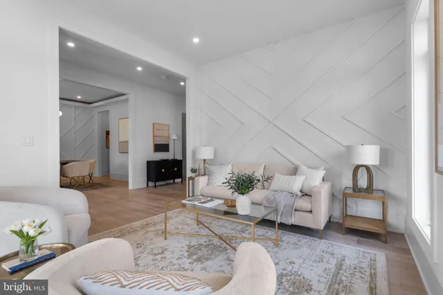 a large kitchen with lots of counter space dining table and chairs