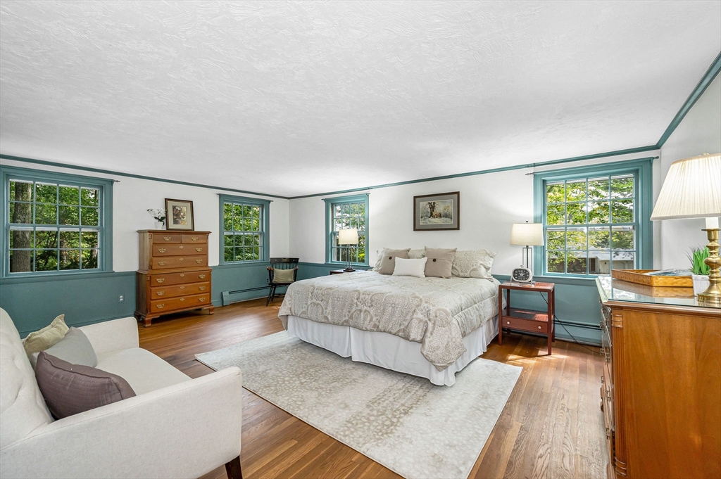 8 Greenwood Road Reading, MA 01867 - Photo 16 of 39 a bedroom with furniture and a window