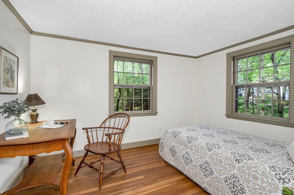 8 Greenwood Road Reading, MA 01867 - Photo 23 of 39 a bedroom with a bed and a window