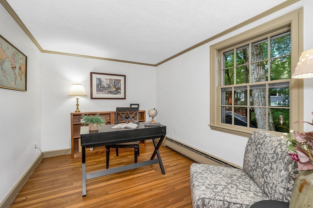 8 Greenwood Road Reading, MA 01867 - Photo 25 of 39 a living room with furniture and a window