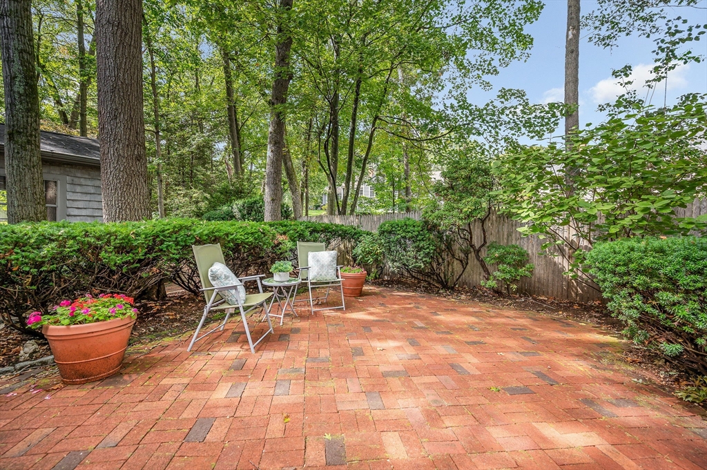8 Greenwood Road Reading, MA 01867 - Photo 34 of 39 a view of a backyard with sitting area
