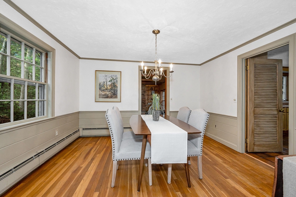 8 Greenwood Road Reading, MA 01867 - Photo 5 of 39 a view of a dining room with furniture window and wooden floor