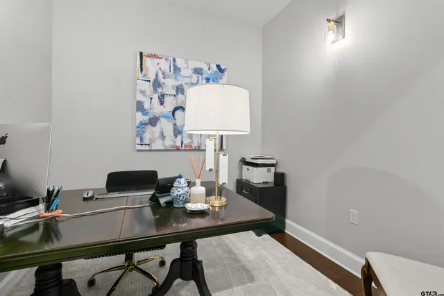 a view of a workspace with furniture