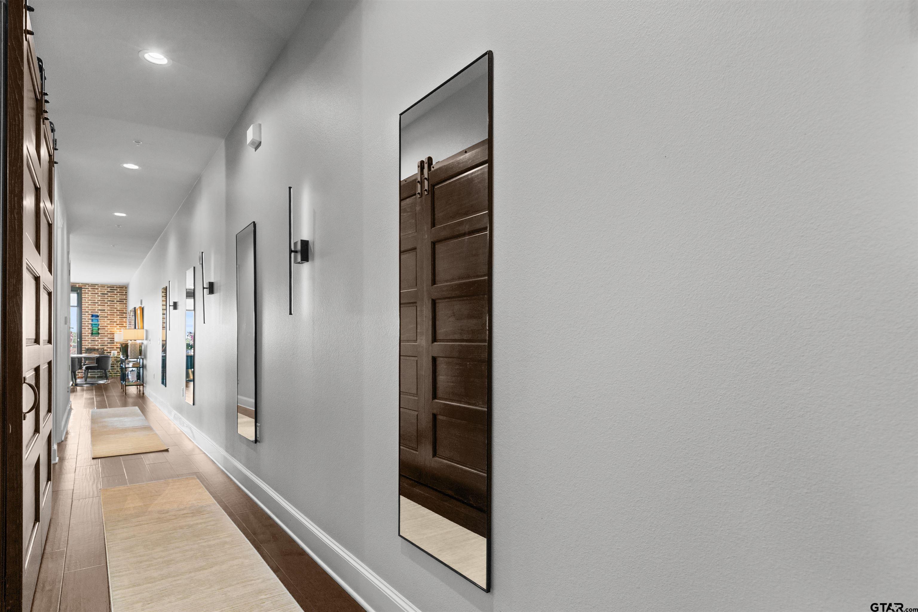 2981 Crest Ridge Drive, Unit 7 Tyler, TX 75703 - Photo 20 of 22 a view of a hallway