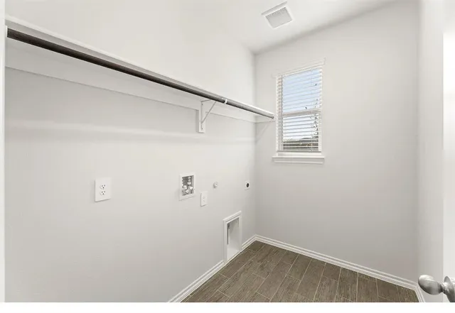 a bathroom with a shower and a window