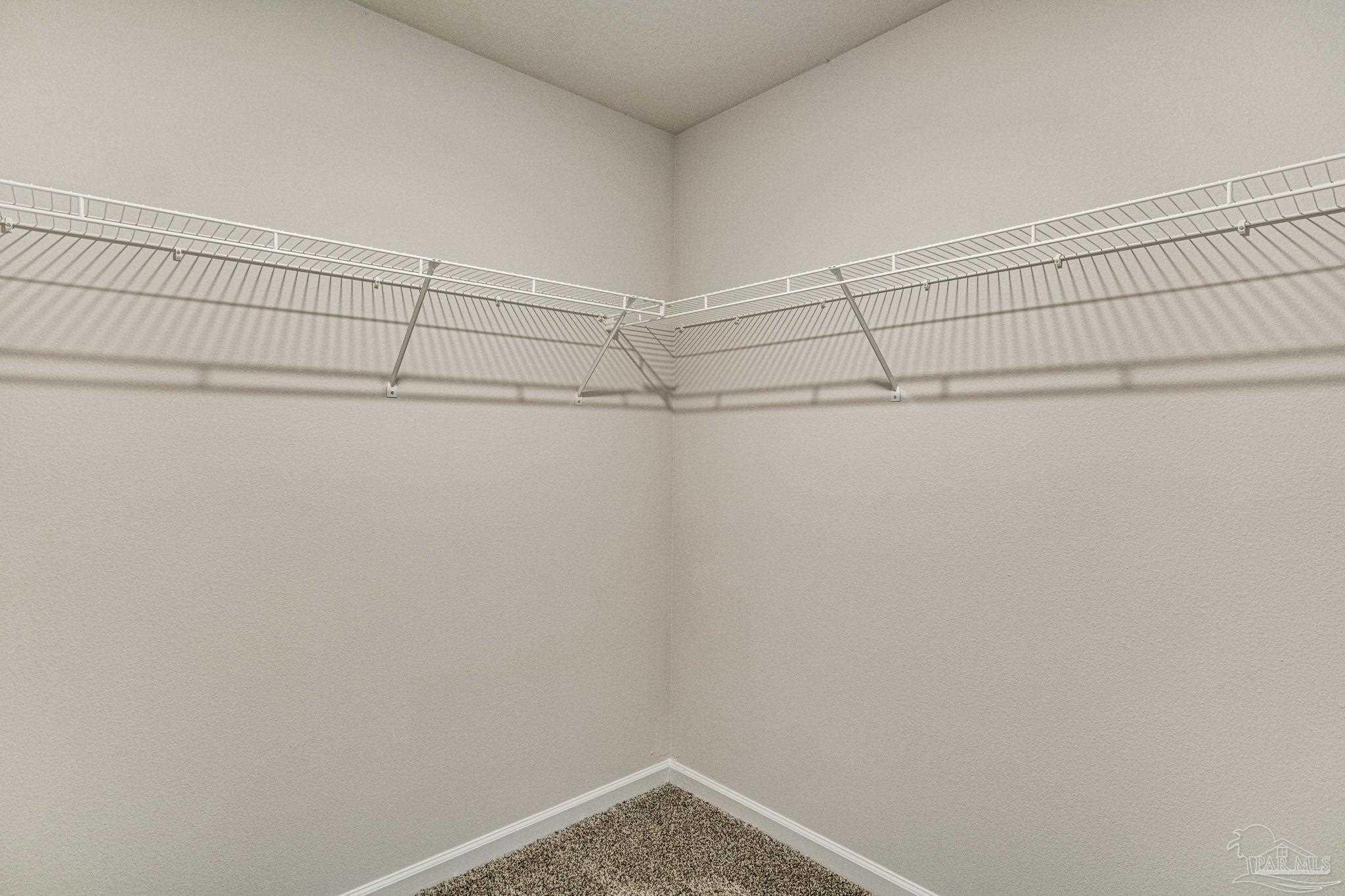4425 Marine Loop Crestview, FL 32539 - Photo 18 of 33 a view of a room with racks on the wall