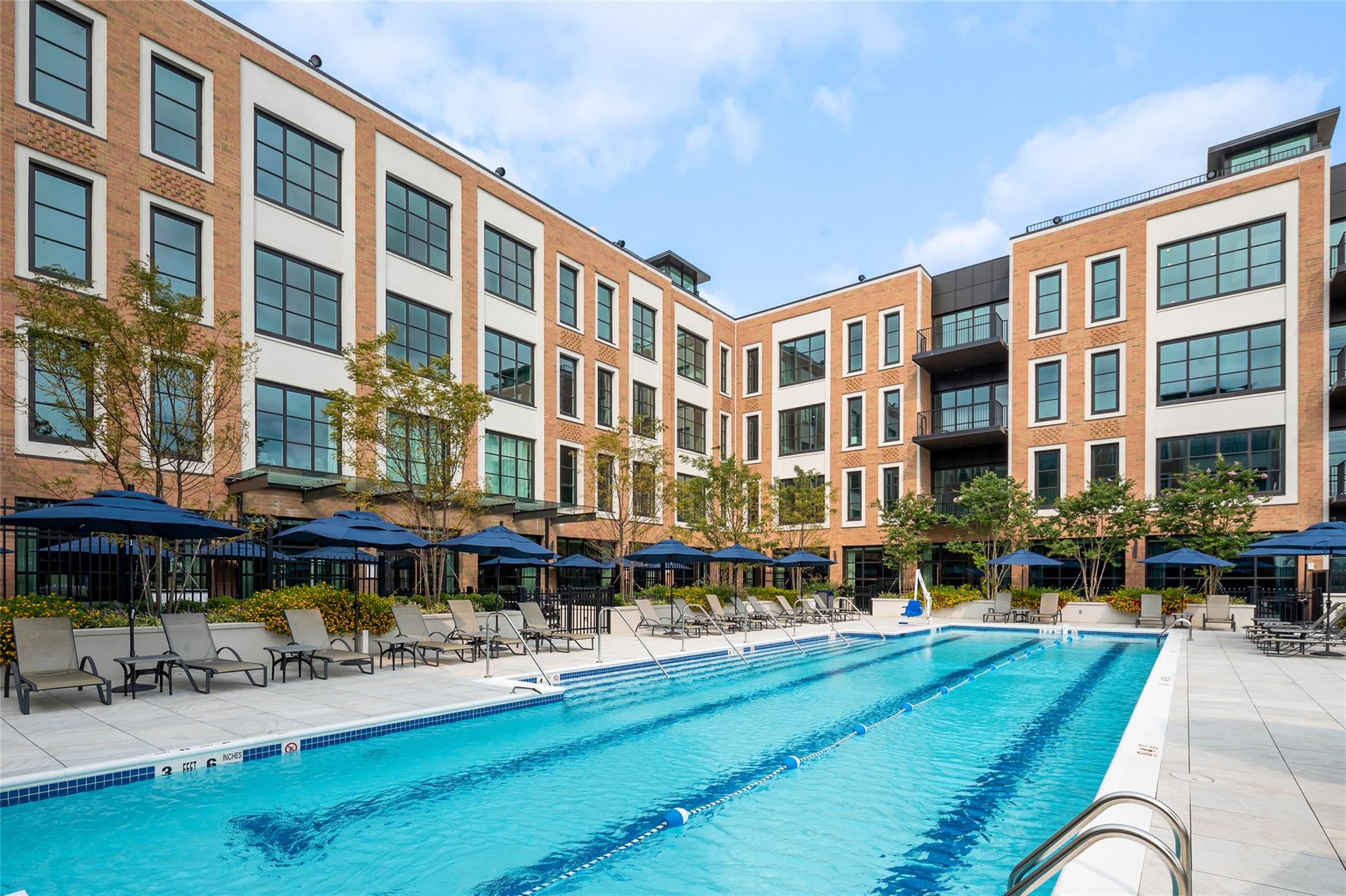 100 Garvies Point Road, Unit 1211 Glen Cove, NY 11542 - Photo 23 of 24 View of swimming pool with a patio