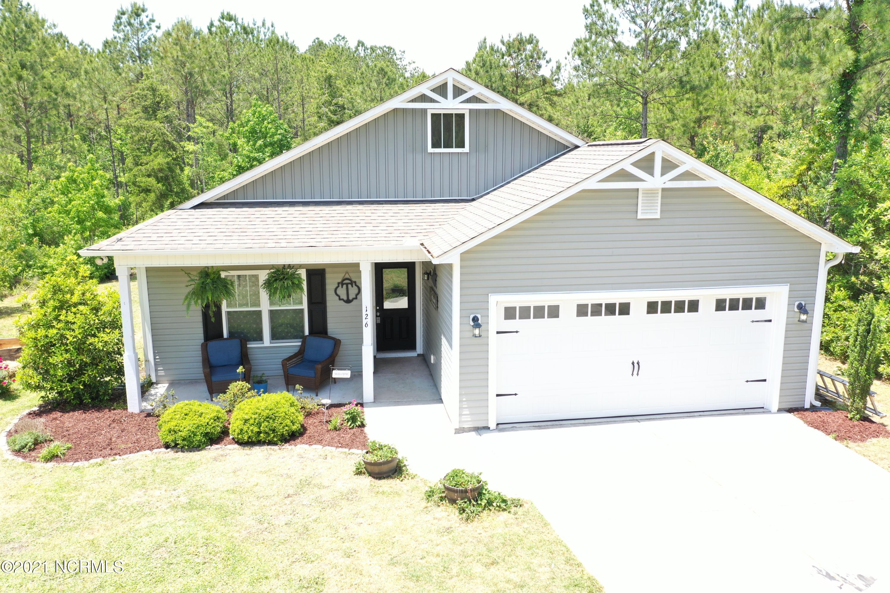 126 Penny Lane Holly Ridge, NC 28445 - Photo 1 of 31 Front
