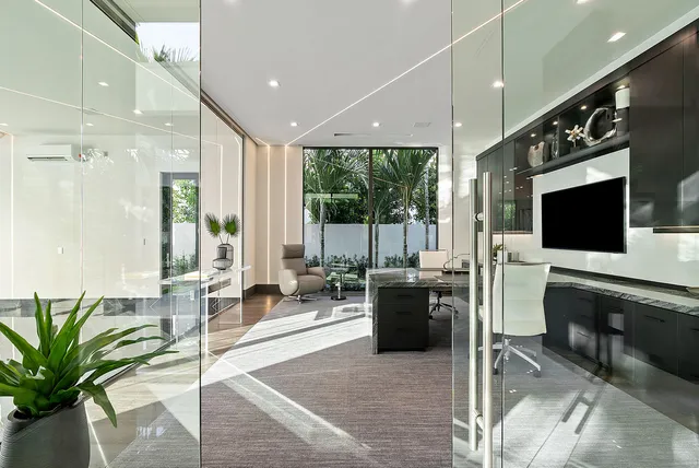 a bathroom with a double vanity sink mirror and shower