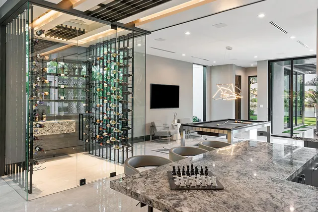 a front view of multiple houses with yard