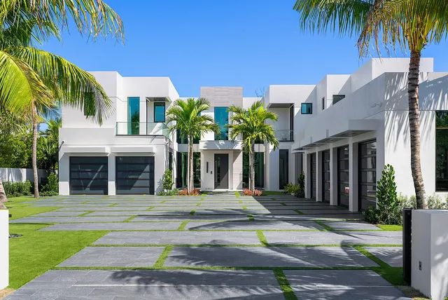 a view of a house with a yard porch and furniture