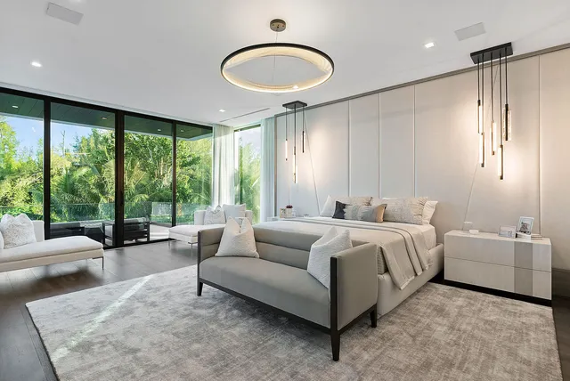 a view of a house with swimming pool and yard