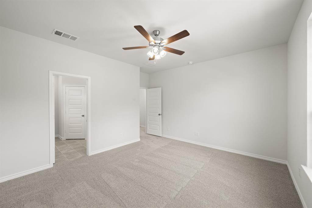 409-411 Saddle Drive Denton, TX 76209 - Photo 16 of 29 a view of an empty room