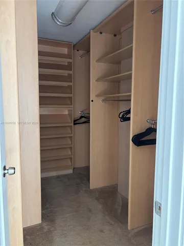 a view of a backyard with sitting area