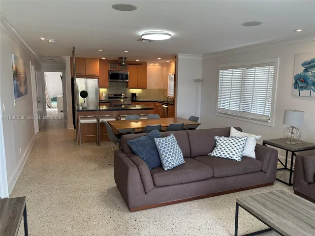 a living room with furniture and a couch