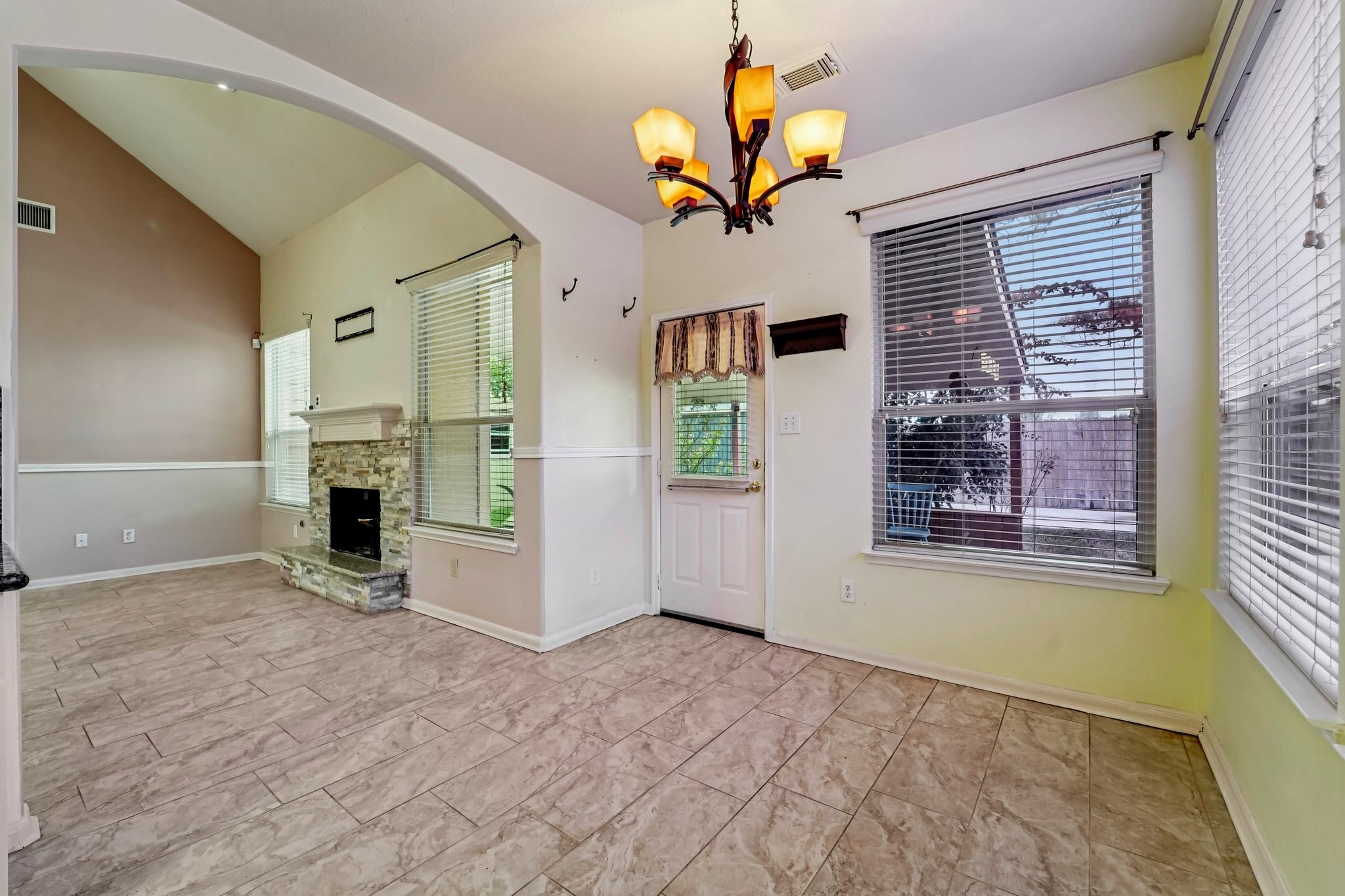 3818 Ridge Canyon Road Baytown, TX 77521 - Photo 7 of 32 a view of a livingroom with a ceiling fan and window