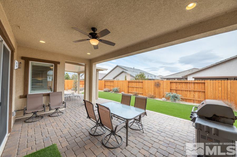 2285 Trakehner Lane, Unit NV Reno, NV 89521 - Photo 20 of 23 a living room with furniture and a large window