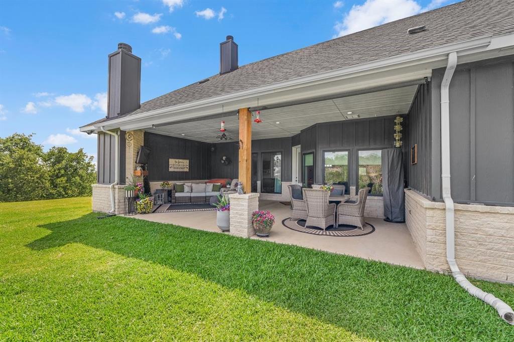 1059 Sweeney Way Weatherford, TX 76087 - Photo 28 of 37 Expansive covered patio featuring recessed lighting, and a wood structural post