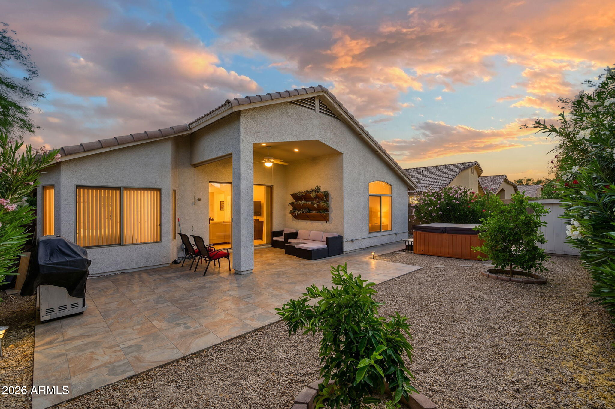 3136 East Roveen Avenue Phoenix, AZ 85032 - Photo 2 of 38 a view of a house with backyard and sitting area