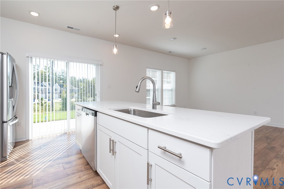 11301 Benton Pointe Way Chester, VA 23831 - Photo 11 of 29 a kitchen with a sink and large window