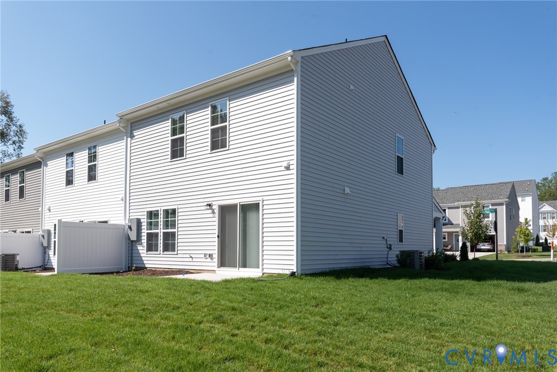 11301 Benton Pointe Way Chester, VA 23831 - Photo 27 of 29 a backyard of a house with lots of green space