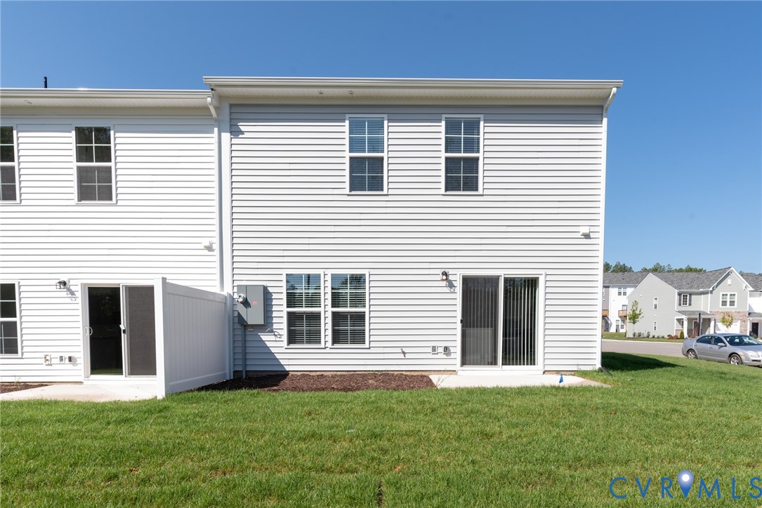 11301 Benton Pointe Way Chester, VA 23831 - Photo 29 of 29 a front view of a house with a yard and garage