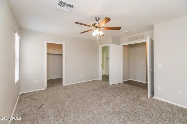 a bathroom with a sink a vanity and a mirror