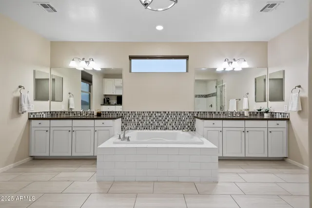 a view of a kitchen with electric appliances