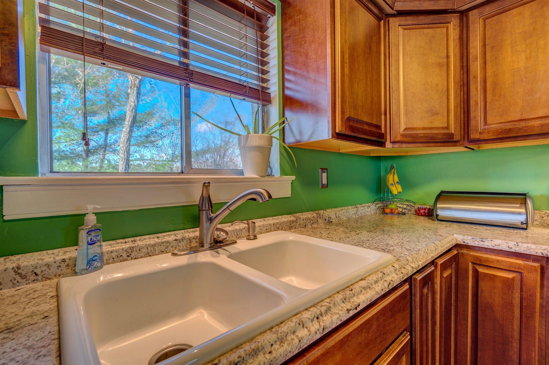 1716 Mountain View Road Vinton, VA 24179 - Photo 12 of 28 a kitchen with a sink and a window