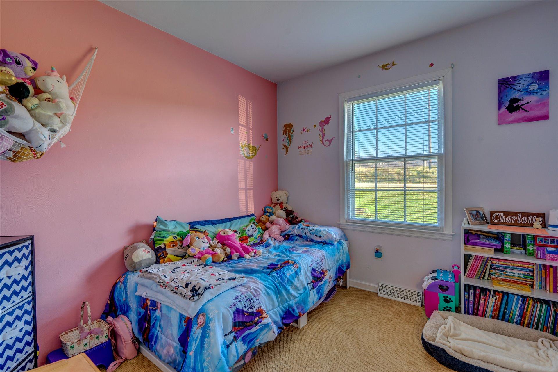 1716 Mountain View Road Vinton, VA 24179 - Photo 14 of 28 a bedroom with bed and a window