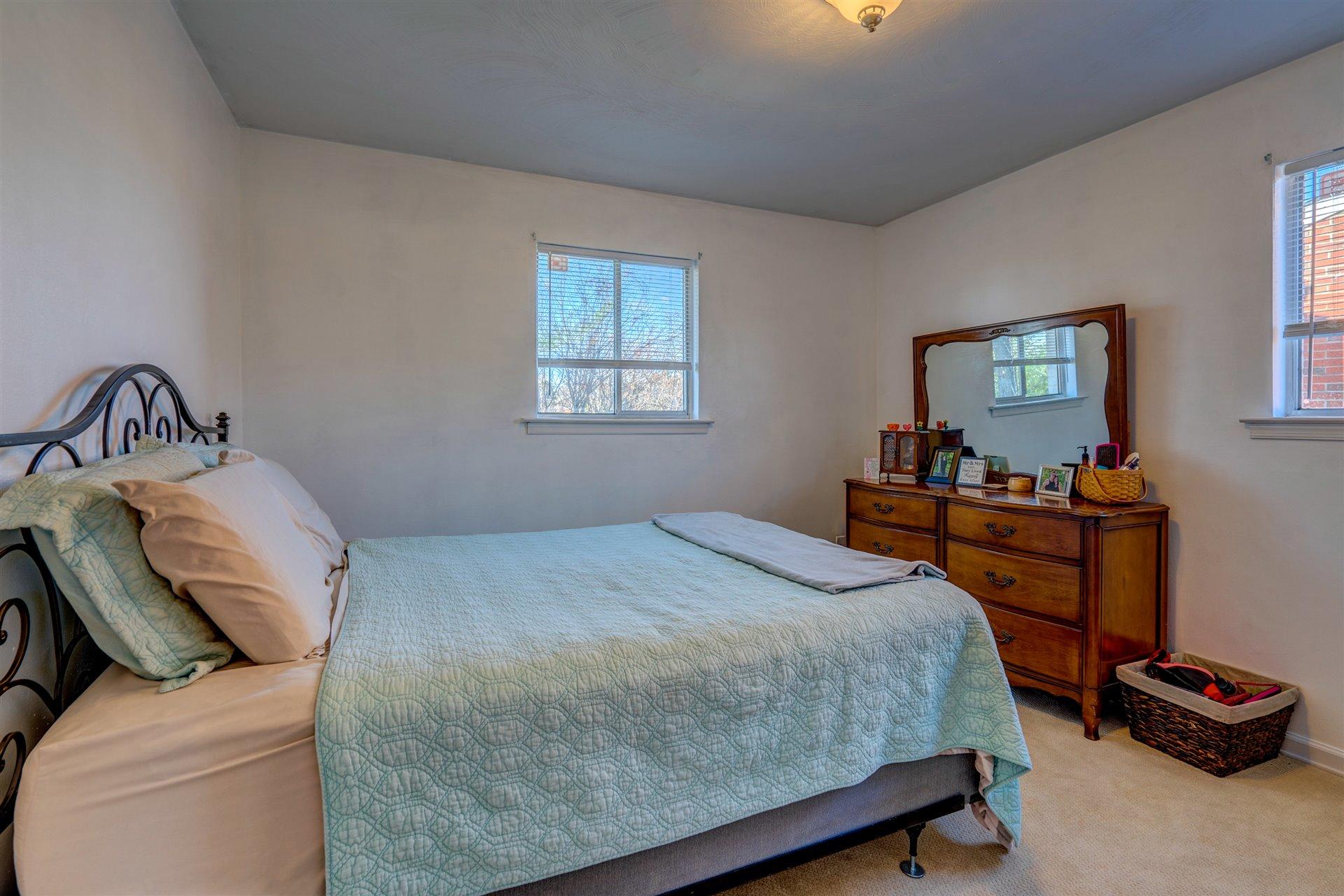 1716 Mountain View Road Vinton, VA 24179 - Photo 16 of 28 a bedroom with a bed and a window