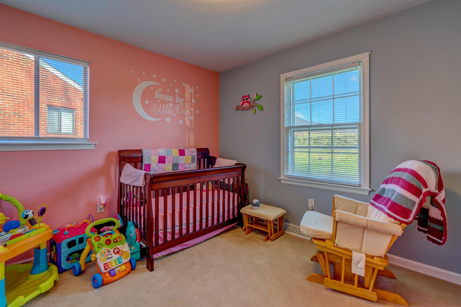 1716 Mountain View Road Vinton, VA 24179 - Photo 17 of 28 a bedroom with furniture and a window